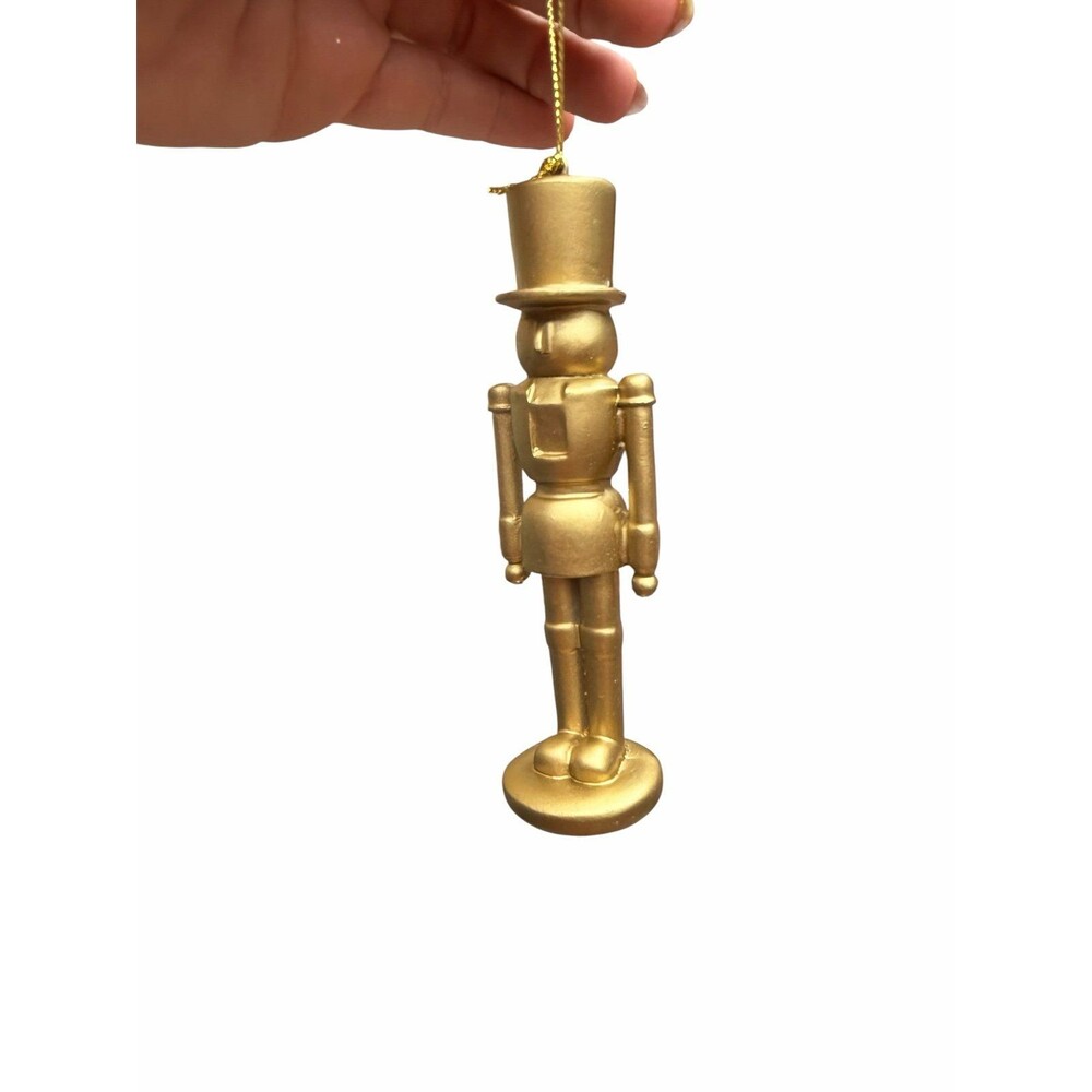 New Macy’s holiday lane gold wooden nutcracker ornament